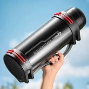 Black insulated stainless steel thermos bottle with red straps and modern design branded giant exploration travel kettle