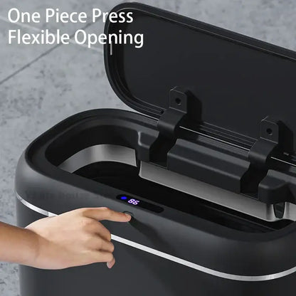 Modern black and silver automatic sensor trash can with sleek one-piece press flexible opening and digital weight display