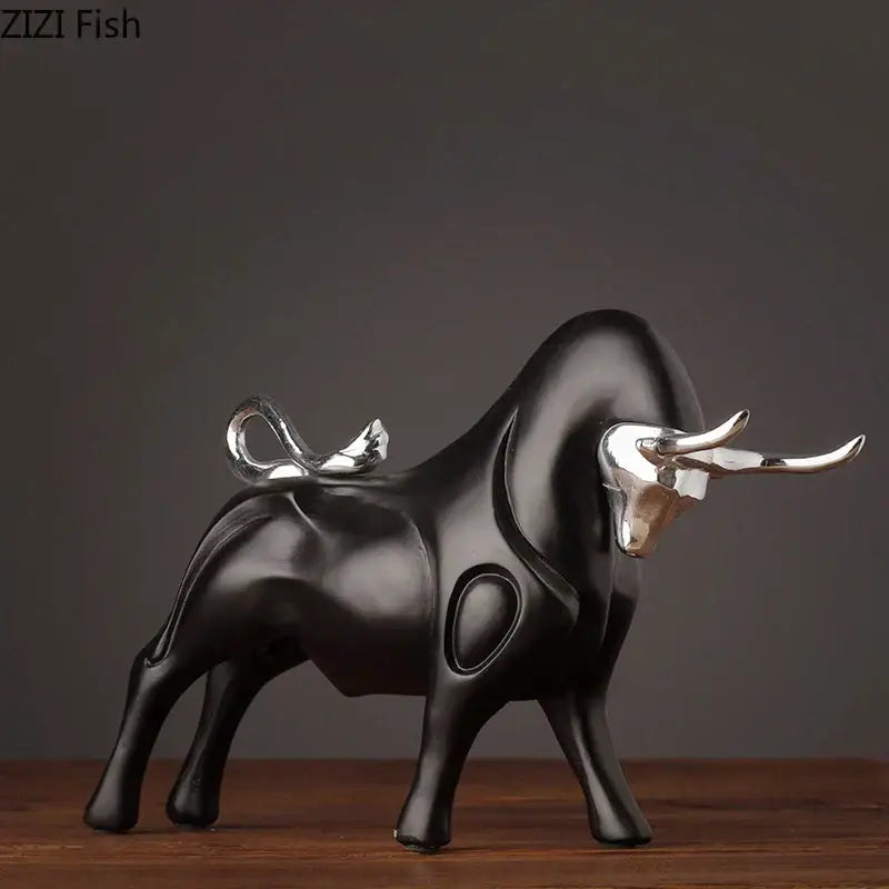Modern black and silver bull sculpture with polished metallic accents by decorbites for living room decorbites bull sculpture