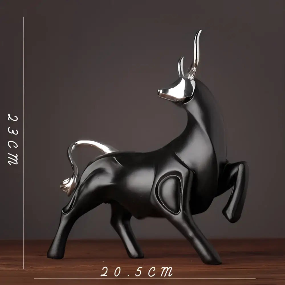 Modern black and silver metallic bull sculpture with sleek stylized design for living room decor by decorbites bull sculpture