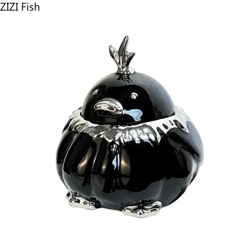 Modern black and silver duck shaped ceramic ashtray with silver metallic accents for living room decorbites duck shaped design