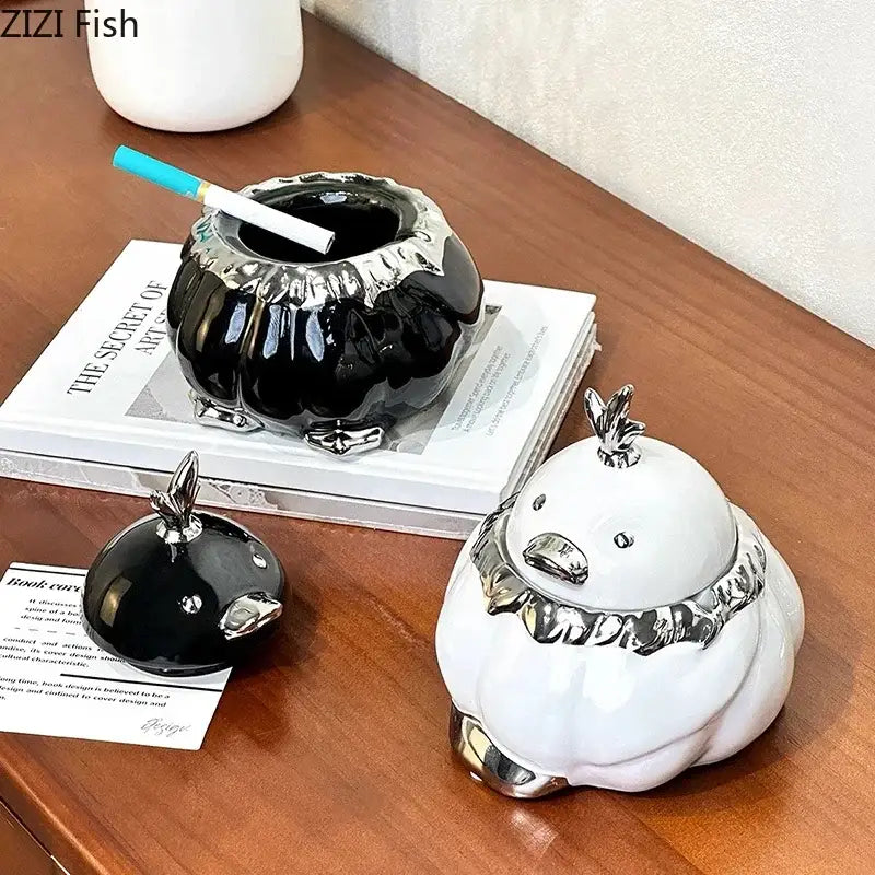 Modern black and silver duck shaped ceramic ashtray with glossy finish and metallic rim for living room decorbites decorbites duck shaped ashtray