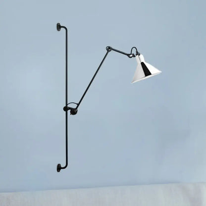 Modern black and white articulated bedroom wall lamp direct wired with white conical shade and black triangular accent