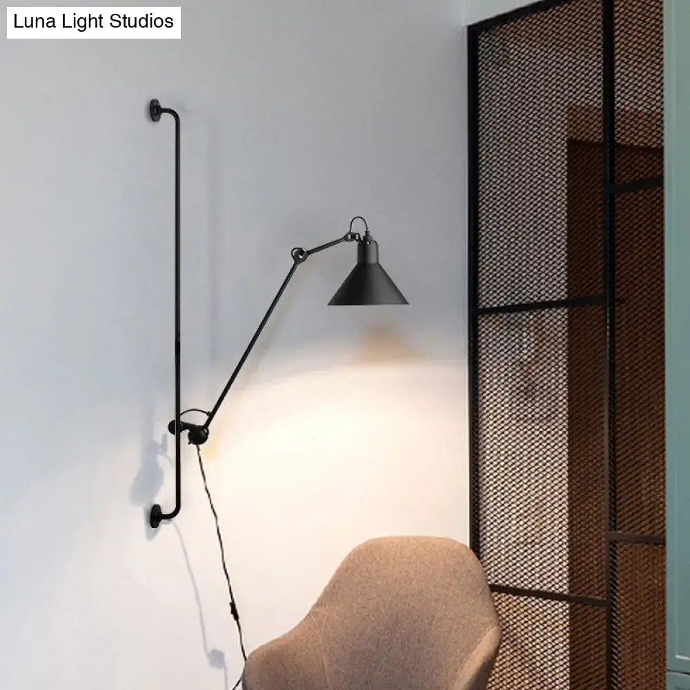 Black industrial-style direct wired electric wall-mounted lamp with articulated arm and conical shade for bedroom use