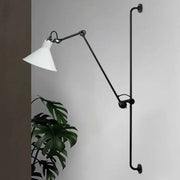 Modern black and white articulated bedroom wall lamp with white conical shade direct wired electric lighting option