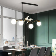 DecorBites™ modern black metal dining room island light pendant with four white glass bulbs, doves, and adjustable cord length