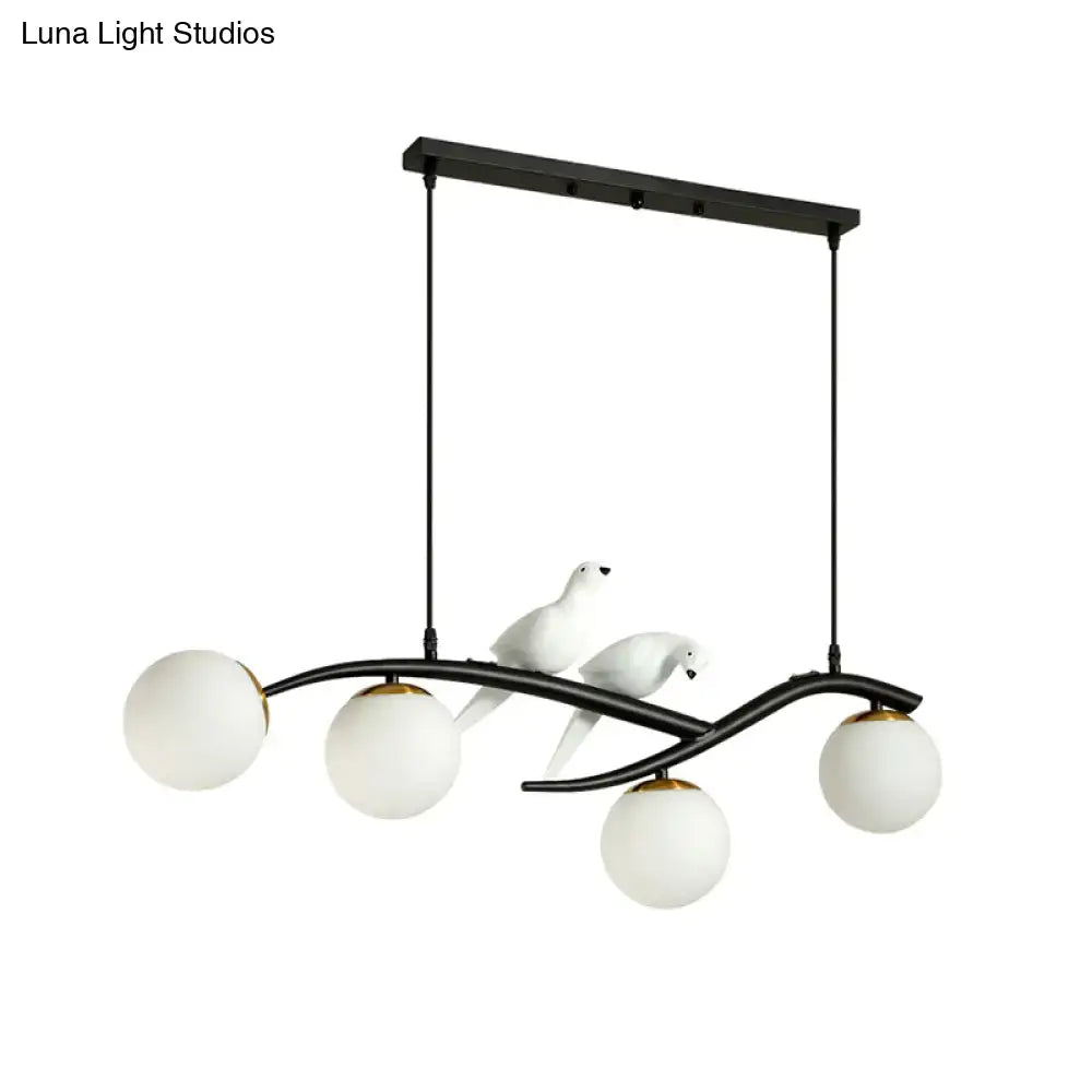 Black metal dining room island light pendant with four frosted glass globes ceramic bird accents adjustable cord length