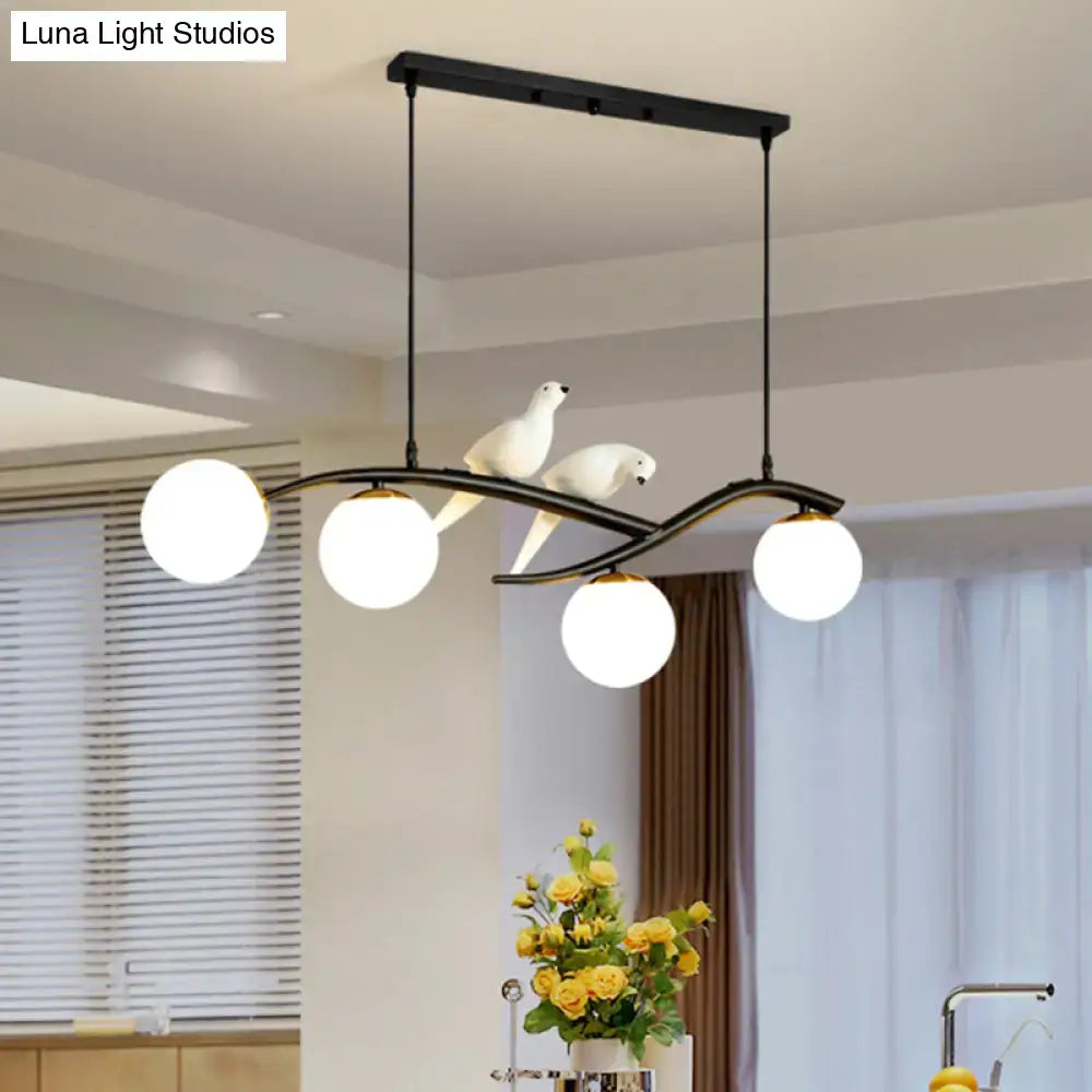 Decorbites contemporary black metal island light pendant with three white glass globes and two white dove figures with adjustable cord length for dining room