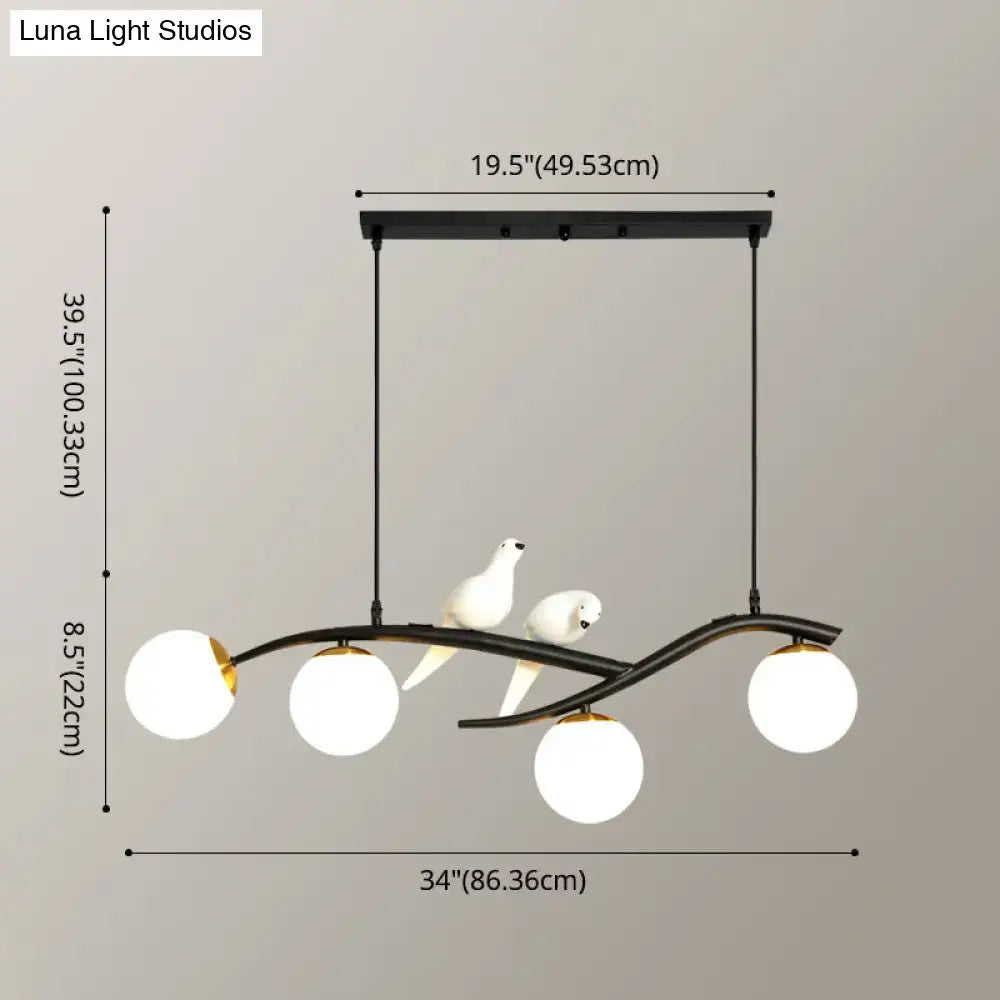 Modern black and white bird linear island pendant light with black metal frame glass shades and ceramic doves