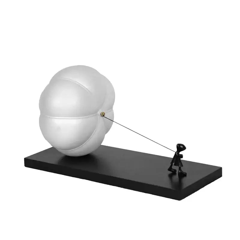 White glossy resin modern cartoon balloon man sculpture pulling segmented sphere for living room decor