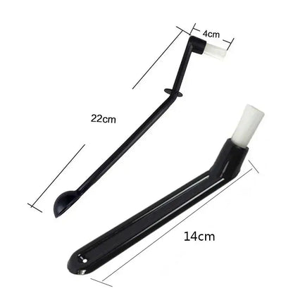 Modern black and white decorbites coffee machine brush with a black plastic scoop and white bristle brush attachment