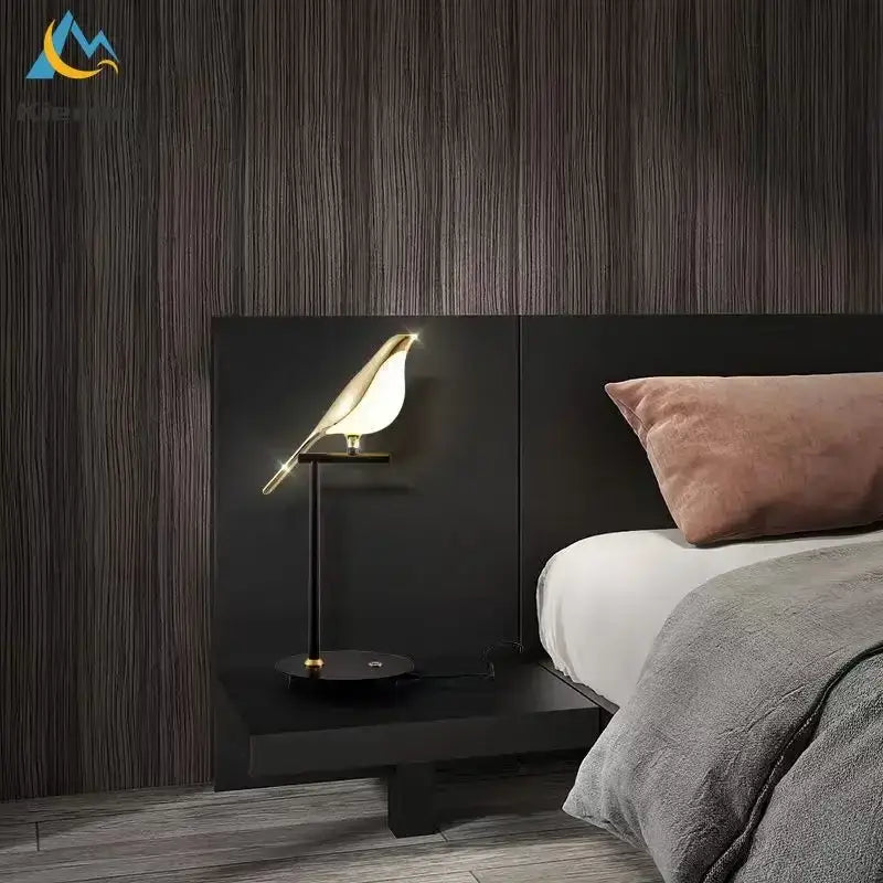 A modern black and white crow led floor lamp with a sleek bird-shaped design and gold-toned accents for decorbites crow led decor