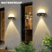 Modern black and white dome led wall lamp with sleek metal base and translucent diffuser for bedroom and garden use