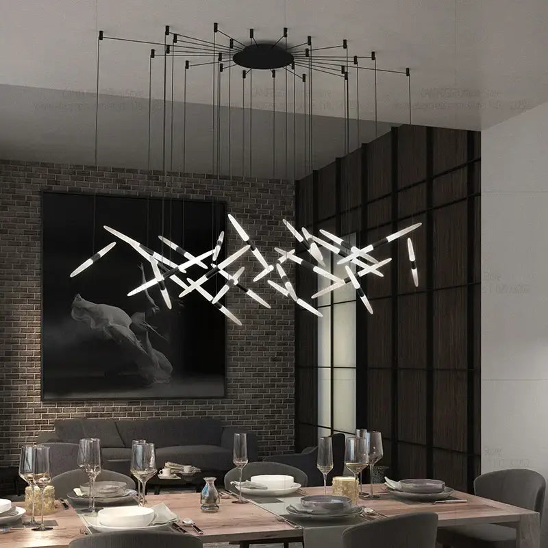 Modern black and white geometric pendant light with sleek white acrylic rods and black metal frame d50 x h300cm