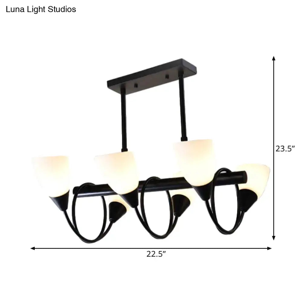 Modern black metal light fixture with five frosted glass shades and curved arms as a kitchen pendant light