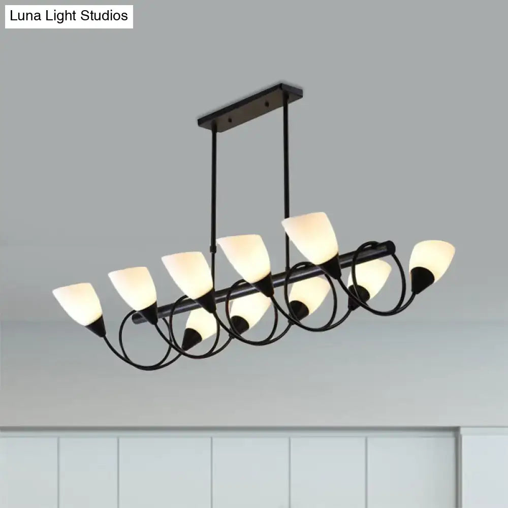 Modern black metal light fixture with seven frosted white glass shades in a curved design kitchen pendant light