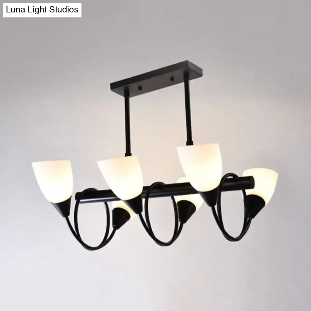 Modern black metal light fixture with five frosted glass shades and curved arms for kitchen pendant light use