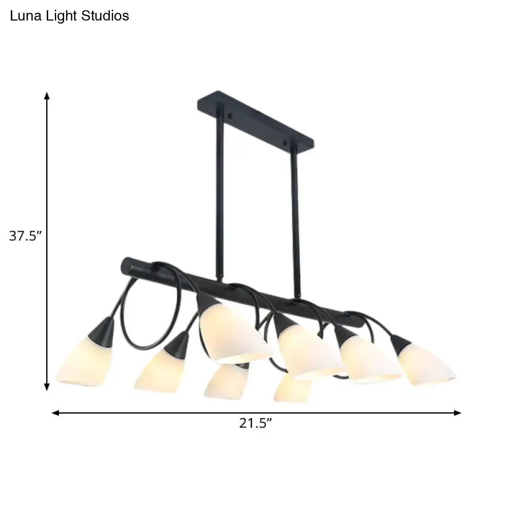 Modern black metal light fixture with eight frosted glass shades designed as a kitchen pendant light