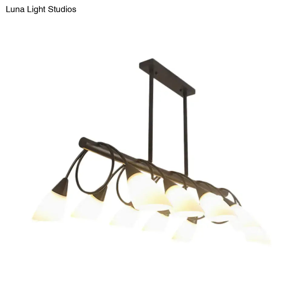 Modern black metal kitchen pendant light fixture with multiple frosted white glass shades for kitchen pendant lighting