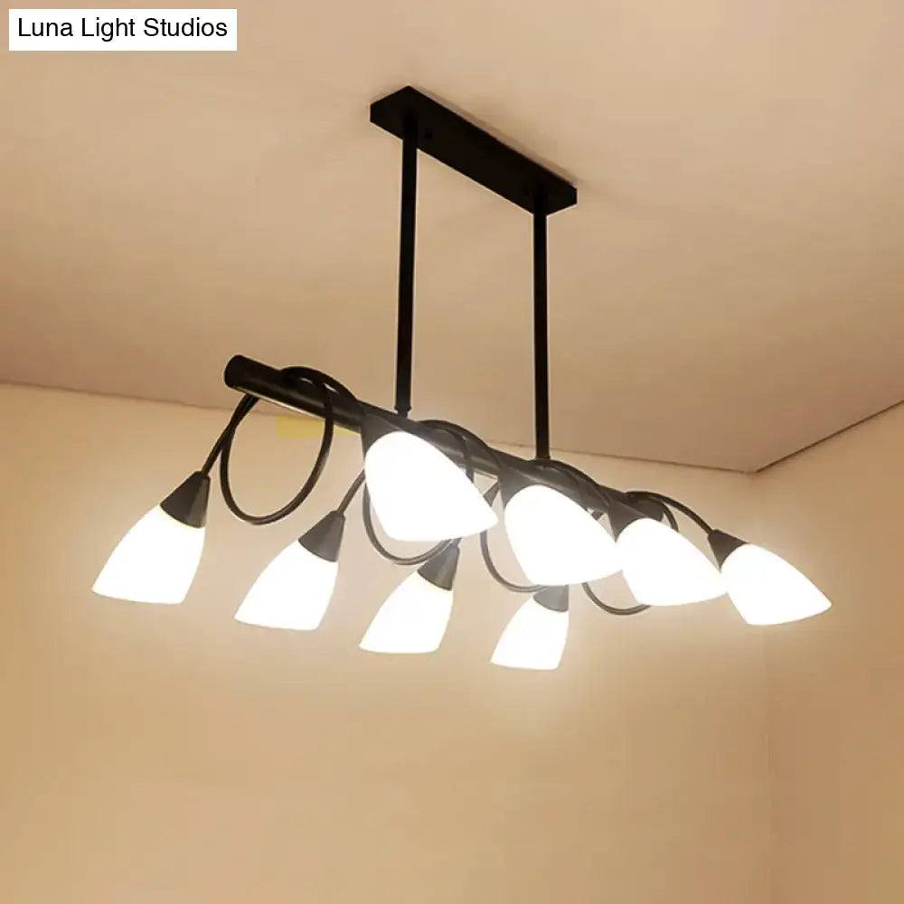 Modern black metal kitchen pendant light fixture with six frosted white glass shades for kitchen lighting