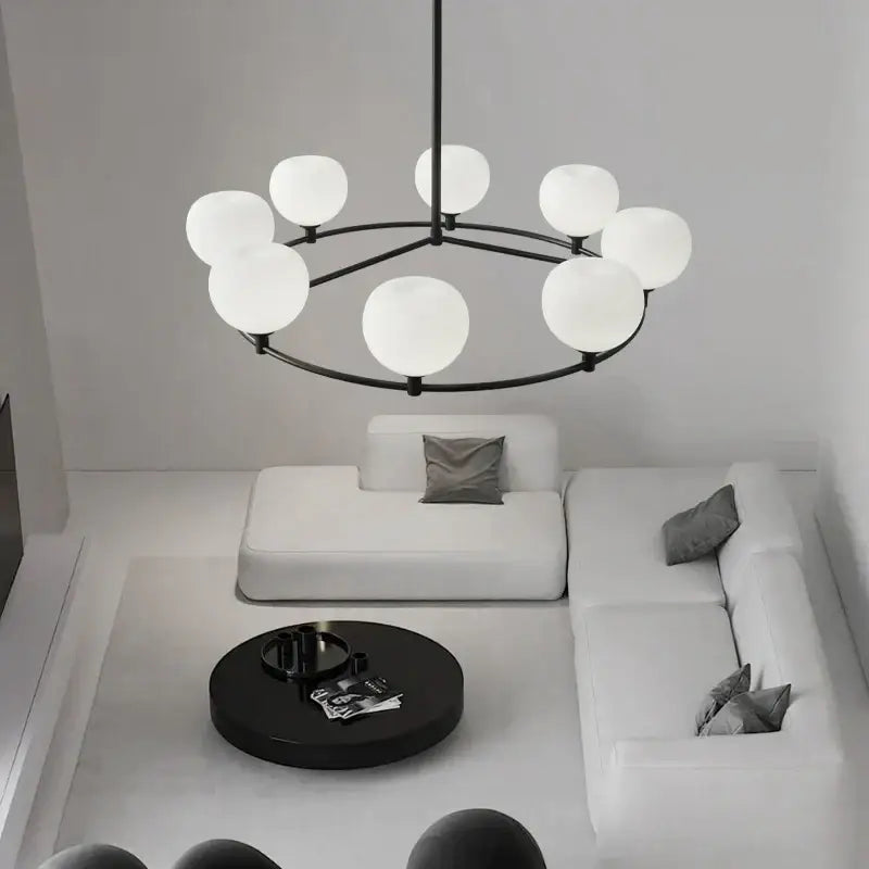 Modern black metal pendant lamp with nine frosted white glass globes for dining room lighting