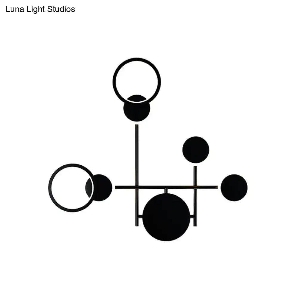 Modern black and white metallic round led wall sconce with geometric circular led wall elements for living room lighting