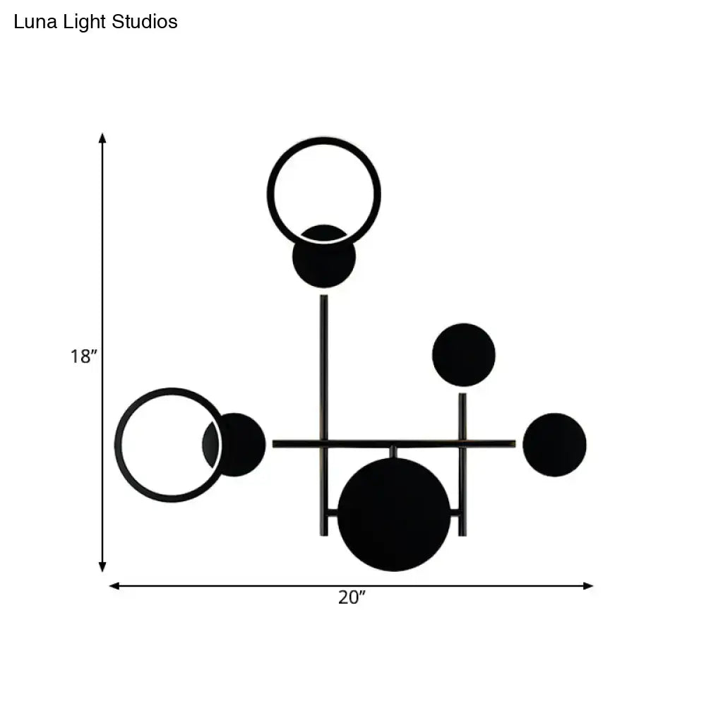 Modern black and white metallic round led wall sconce with minimalist abstract geometric spheres and rings for living room