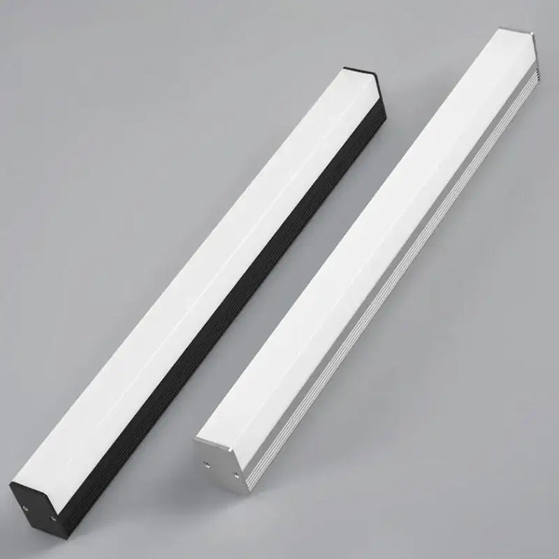 Modern black and white rectangular led wall lamp with slim matte black and brushed silver profiles for bedroom lighting