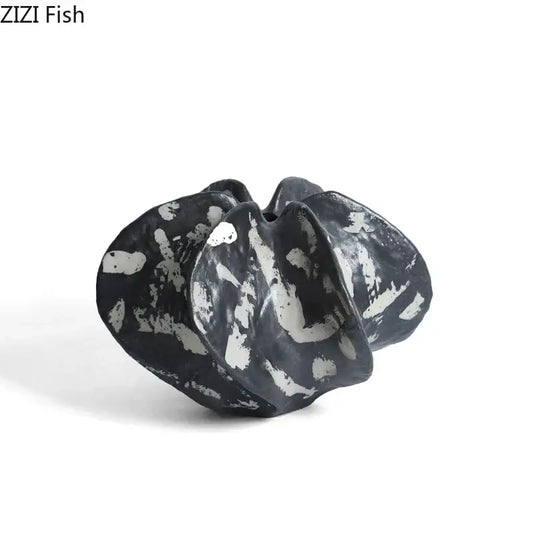 Modern black and white starfruit coral abstract ceramic sculpture with textured organic form for bedroom decor