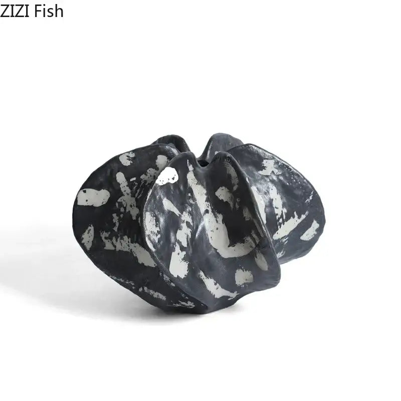Modern black and white starfruit coral abstract ceramic sculpture with textured organic form for bedroom decor