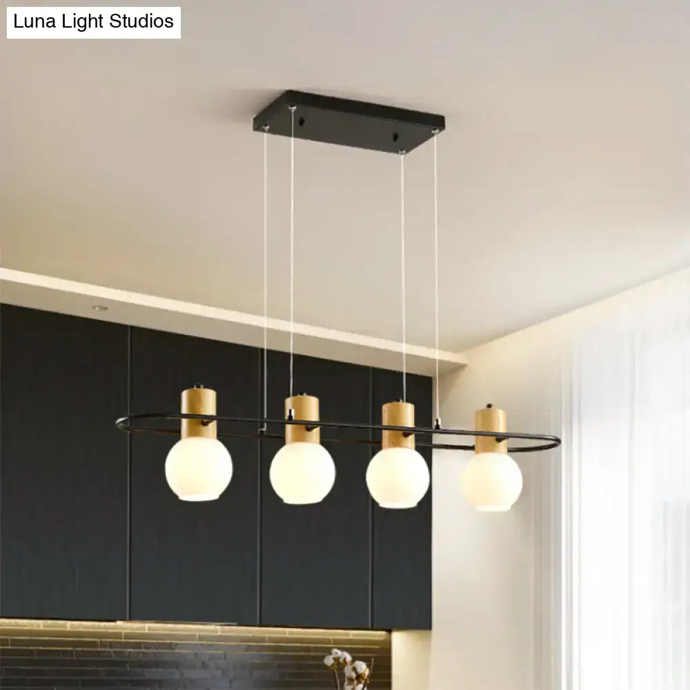 Decorbites black orb island pendant light with wood accents and frosted glass hanging globes for modern decor
