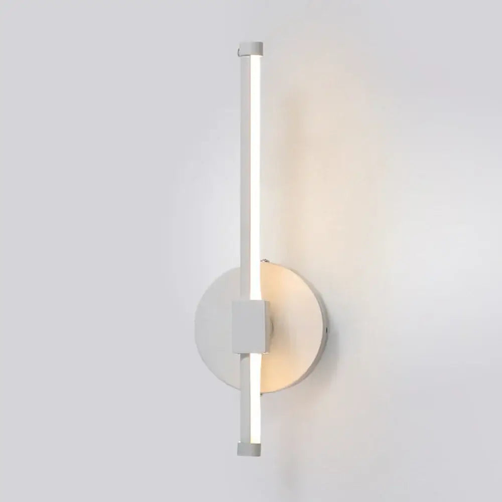 Modern white led wall light with sleek vertical bar and circular base for decorbites indoor led bedroom decor