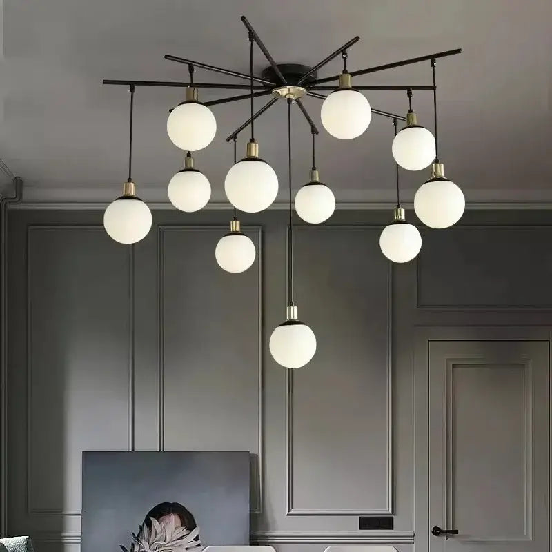 Modern black metal chandelier with white art glass ball globes suspended by cords for living room decorbites art glass lighting
