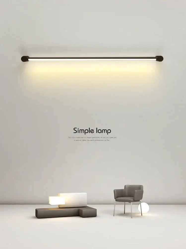 Minimalist decorbites black bar linear wall light with sleek black design and warm ambient lighting for living room decor