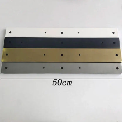 Four 50cm rectangular metal base plate lighting accessories in white black gold and silver with circular holes for living room display stand