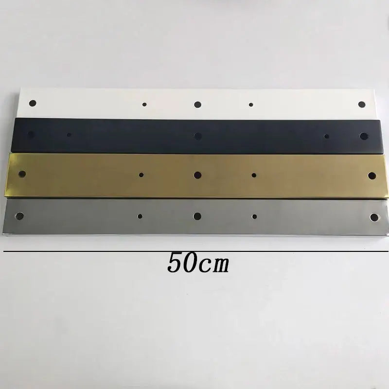 Four 50cm rectangular metal base plate lighting accessories in white black gold and silver with circular holes for living room display stand