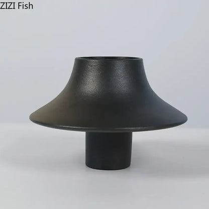 Modern black bell shaped decorbites ceramic vase with matte finish and cylindrical base for desktop decor