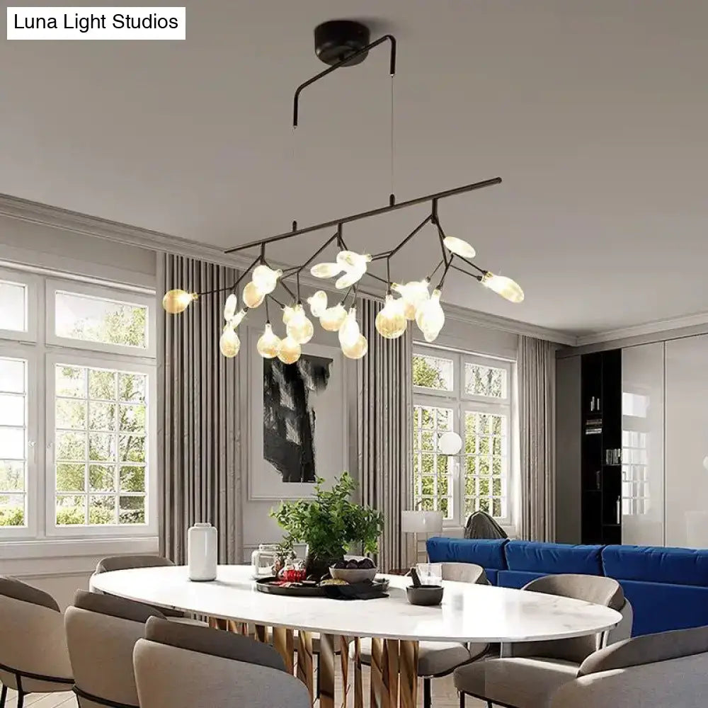 Modern black branching chandelier with frosted glass globe bulbs designed for elegant dining room lighting