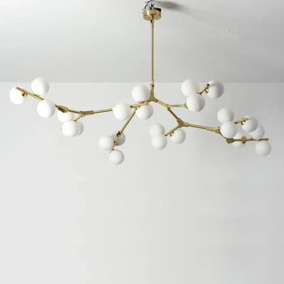 Modern gold-toned branch-style pendant lights with white glass balls led globes for stylish living room decorbites glass balls