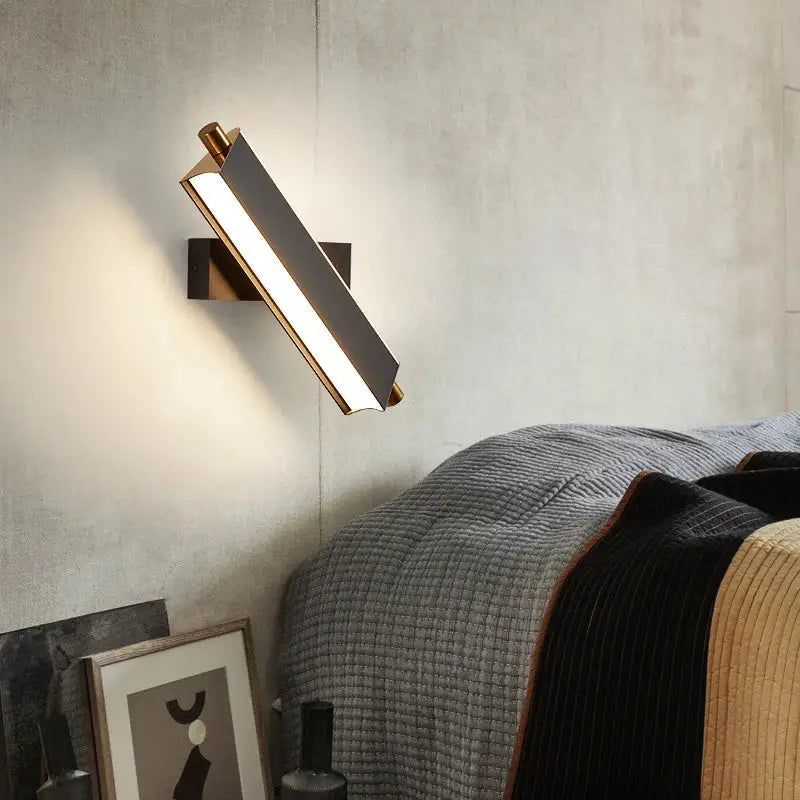 Modern black and brass decorbites adjustable led wall lamp with a sleek rectangular design for bedroom sconce decor