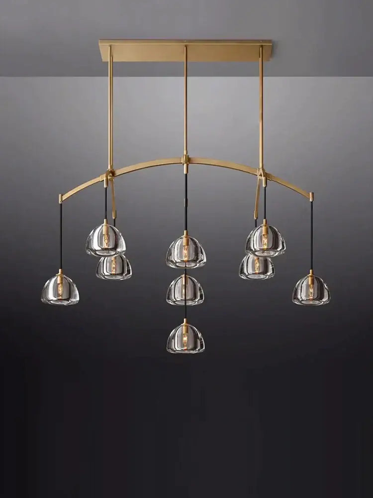 Modern black brass american series crystal led chandelier with gold-toned brass and clear glass pendant shades for dining room decorbites black brass