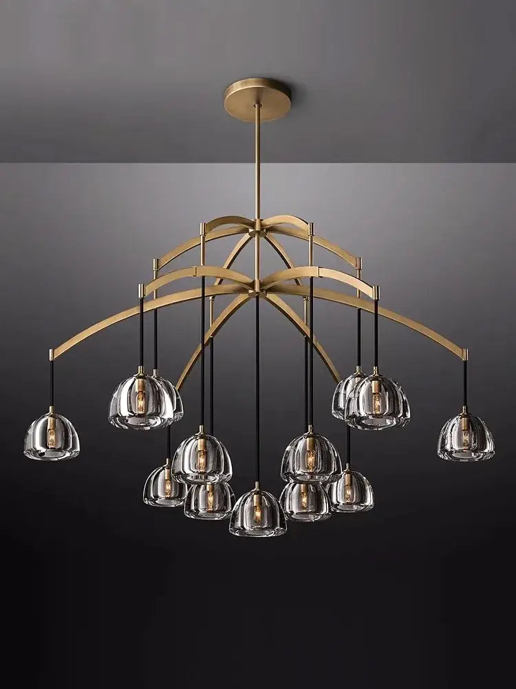 A modern black brass american series chandelier with clear glass globes and black cords for dining room decorbites black brass
