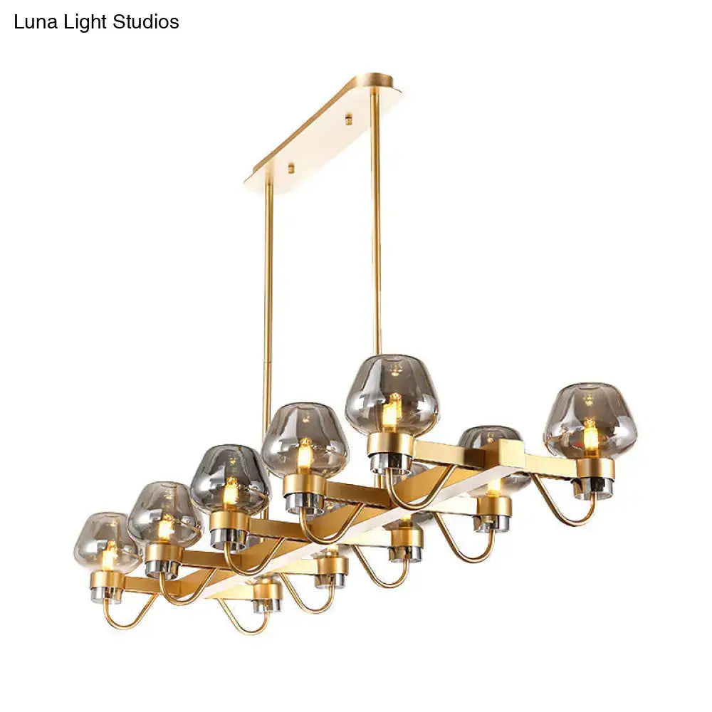 Gold-toned decorbites contemporary island lamp with 6 smoked glass globes and sleek metal frame in clear amber smoke tones 110v-120v