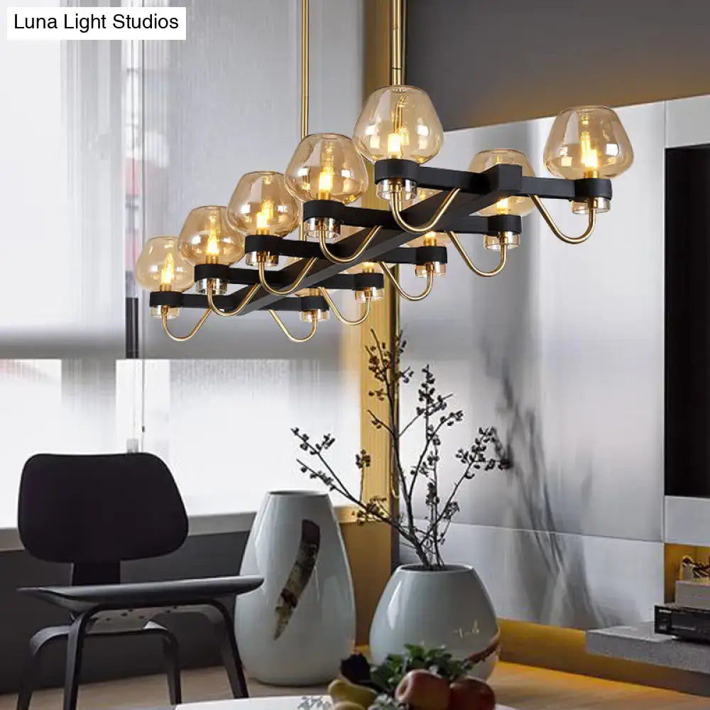 DecorBites™ contemporary island lamp with black metal frame, gold accents, and clear amber smoke glass globes, 110v-120v