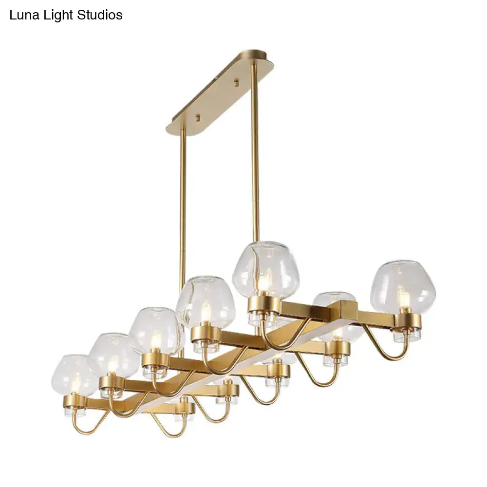 Gold-toned DecorBites™ contemporary island lamp with 10 clear amber smoke glass bulbs in black brass finish 110v-120v