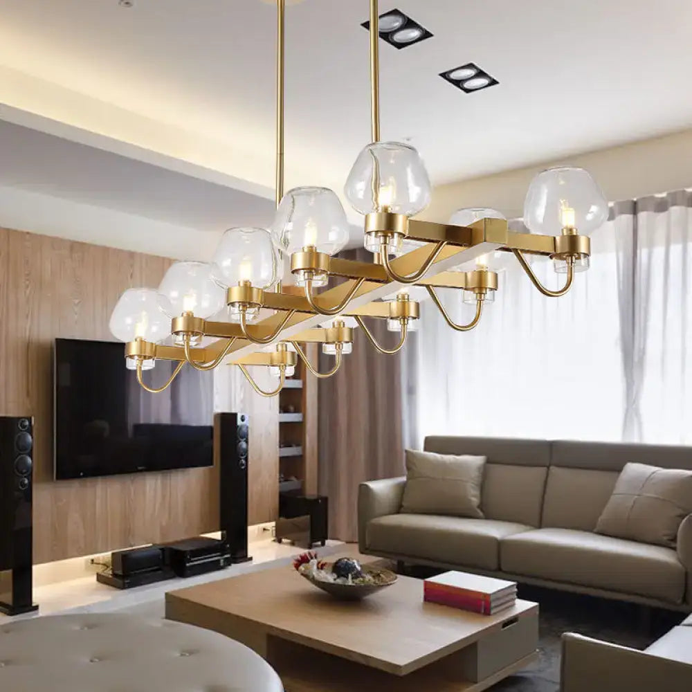 Gold-toned DecorBites contemporary island lamp with 10 clear glass globe shades in clear amber smoke 110v-120v fixture