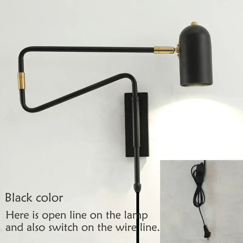 Modern black wall lamp with brass accents and decorbites adjustable long-arm for bedroom lighting