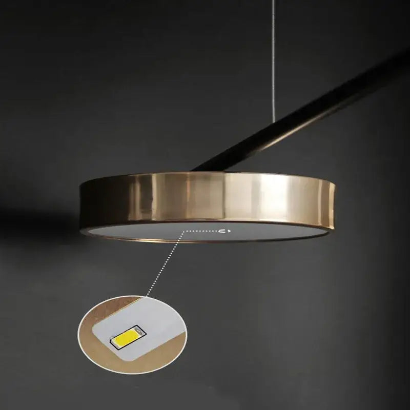 Modern black and brass geometric led chandelier with sleek brass frame and integrated led bulb by decorbites geometric led