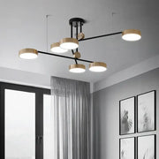 Modern black and brass geometric led chandelier with circular bulbs for dining room decorbites geometric led lighting