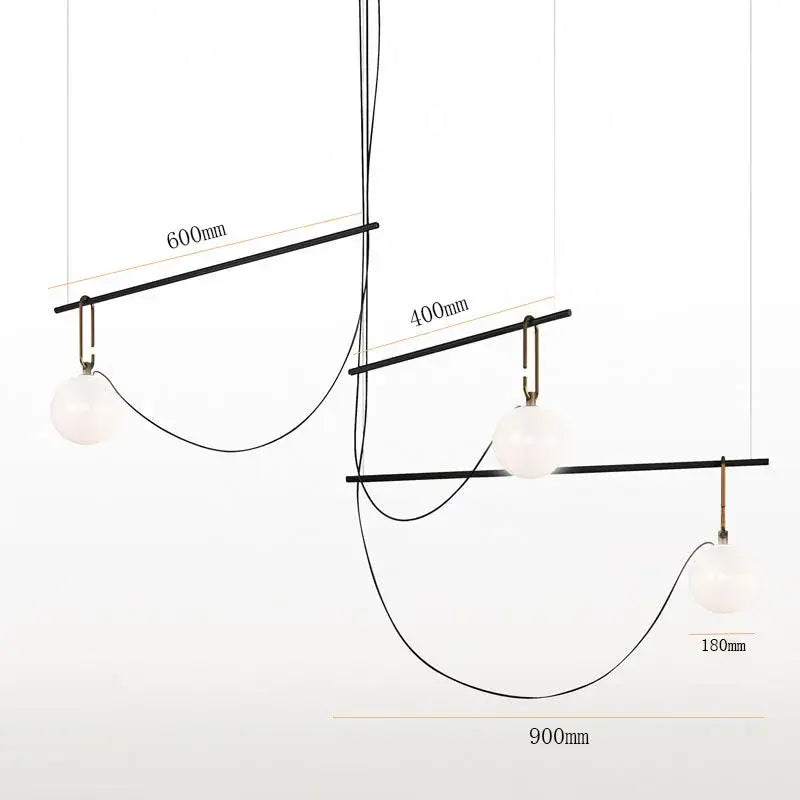 Modern black metal pendant light with three frosted glass ball globes by decorbites for bedroom decor